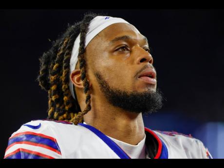 Credit: AP Buffalo Bills defensive back Damar Hamlin leaves the field after an NFL football game against the New England Patriots on Thursday, December 1, 2022, in Foxborough, Massachusetts.
