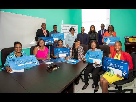 Seated (from left) Fayonnie Stewart-McFarlane, head of the business department at Anchovy High School; Georgia Bissoon, grade-two teacher at Hayes Primary School; Tonian Campbell, grade-one teacher at Bogue Hill Primary; Patra Johnson, infant-two teacher a