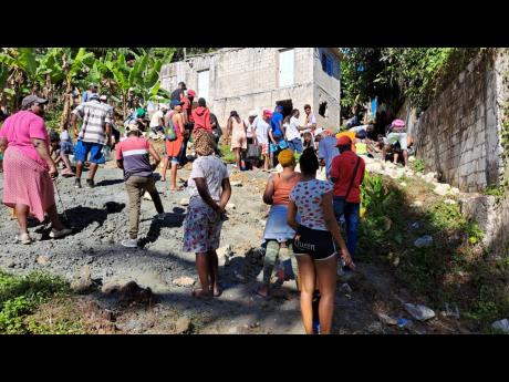 Residents of Chester Castle, Hanover digging for what they hoped was gold in a section of the community known as Top Land.
