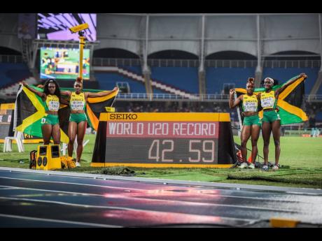 Credit: Courtesy of World Athletics Jamaica's quartet of (from left) Serena Cole, Tina Clayton, Tia Clayton, and Kerrica Hill celebrate breaking the 4x100-metre world under-20 record in the final at the World Under 20 Championships in Cali, Colombia on Friday, August 5, 2022.