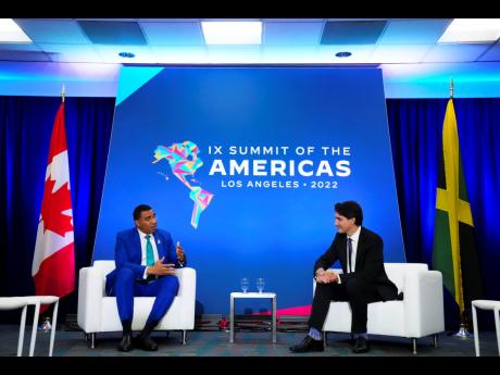 Canadian Prime Minister Justin Trudeau  (right) and Jamaican Prime Minister Andrew Holness at the Summit of the Americas in Los Angeles, United States last June. 