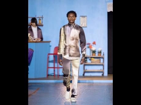 A silk shirt and pants with Oliver Samuels’ face as the print. 
