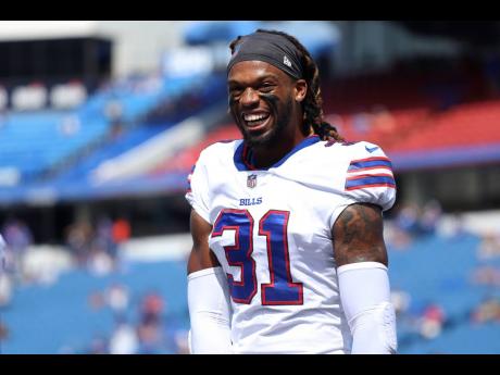 FILE:  Buffalo Bills safety Damar Hamlin smiles prior to the start of the first half of a preseason NFL football game, Saturday, August 28, 2021, in Orchard Park, New York. 