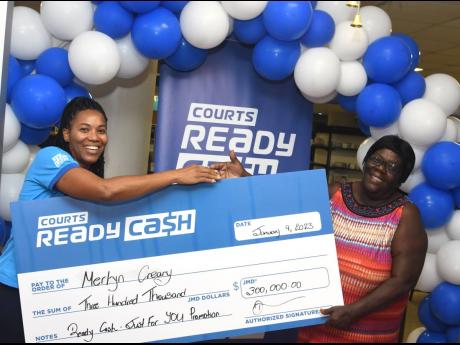 Courts Ready Cash has made four lucky customers richer for the new year. The customers, who walked away with $300,000 each, were selected as part of the brand’s ‘Just for You’ campaign. Here, an excited Merlyn Creary (right), one of the four lucky wi