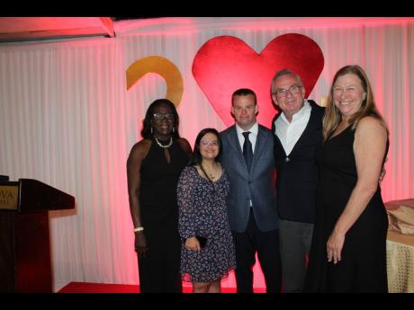 From left: Dr Charmaine Scott, founder and chair of the Jamaica Down’s Syndrome Foundation; Elaine Scialo; Tim Harris; Jeannie Harris; and Keith Harris, at Tim’s birthday dinner at Terra Nova All Suite Hotel