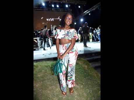 Talentia Fitten wanted simple but cute for her night out and achieved just that with her green purse tying the tropical look together.