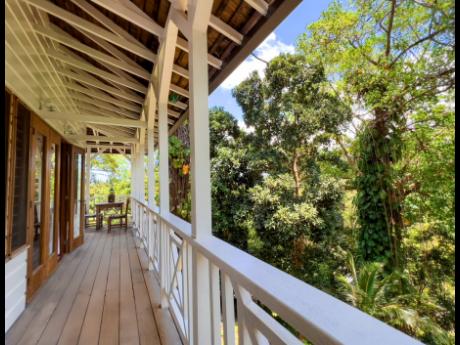 Credit: Contributed The balcony off the primary bedroom that almost wraps around the entire upper level.