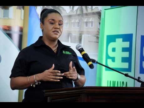JCSD Assistant Manager for Registrar Services, Tamieka Ricketts, gives an overview of the new client portal launched by the Jamaica Central Securities Depository on February 9, 2023.
