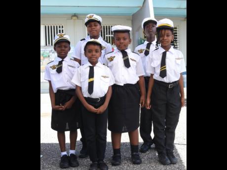 Credit: Ashley Anguin Students of John Rollins Success Primary School. From left (back row): Ashawn Jones and Sebanton Moodie. From left (front row): Jahnae Grant, Mahalia Myers, Marcada Fraser, and Nadiquca Henry in a group photo.