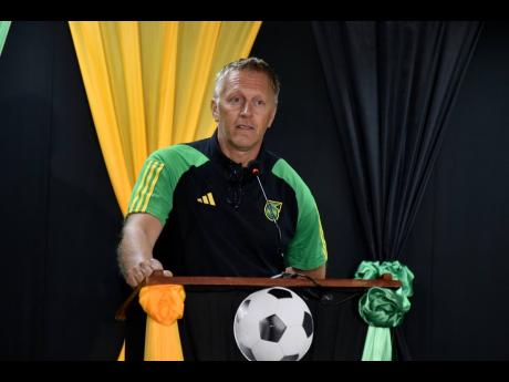 Credit: Kenyon Hemans Reggae Boyz coach Heimir Hallgrimsson speaks to media during the roll-out of the Jamaica leg of the Jamaica Football Federation’s Adidas partnership at its office in New Kingston yesterday.
