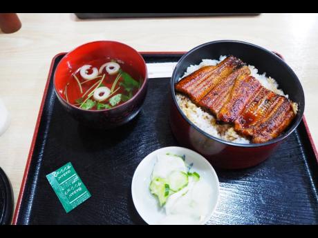Sawara’s famous dish, Ubagi - marinated and grilled eel served on a bowl of white rice, with soup and pickles