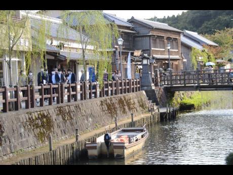 Onogawa river and town of Sawara. The boat on the bank is for boatride tours for tourists.