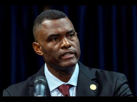 US Attorney Markenzy Lapointe speaks about a network of nursing school operators, centered in South Florida, who allowed students to buy diplomas without the proper training, during a press conference in Miami, Jan. 25, 2023. 