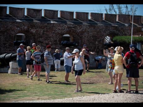 In this 2020 photo tourists are seen at Fort Charles in Port Royal. 