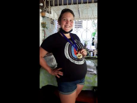 With confidence, some physical discomfort, and a whole lot of know-how, Kow won the top archery prize. 