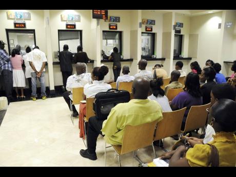 In this file photo, visa applicants wait for their turn to be interviewed at the United States Embassy in St Andrew.