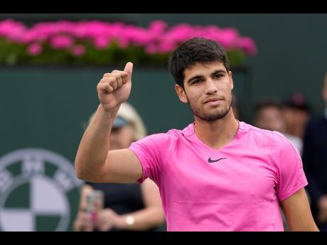 Carlos Alcaraz of Spain celebrates after defeating Russia’s Daniil Medvedev in the men’s singles final at the BNP Paribas Open tennis tournament Sunday, March 19, 2023, in Indian Wells, California.