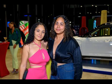 Kacey Holbrook (left) and Amber DaSilva are radiant at the event.