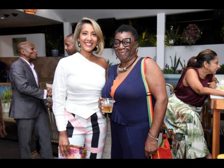 Food entrepreneur Nasma Mohammed-Chin (left) was happy to catch up with marketing, public relations and media specialist Carole Beckford.