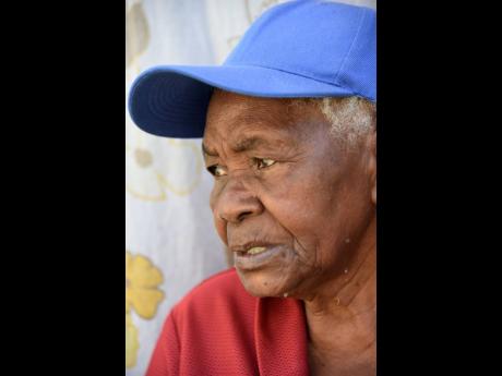 Credit: Ian Allen/Photographer Ninety-year-old Merline McIntosh is in desperate need of assistance to take care of her son, who has a mental illness. She says she is no longer able to care for him due to her age and she is fearful that he could harm her during one of his episodes.