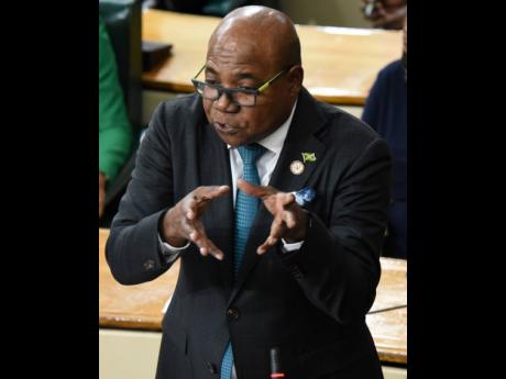 Edmund Bartlett, Minister of Tourism, delivers his address during the Sectoral Debate in the House of Representatives on Tuesday. 