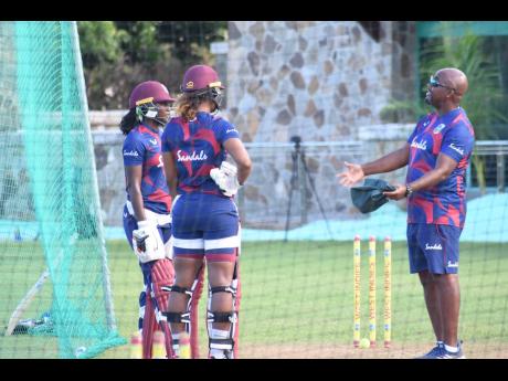 Former assistant coach Robert Samuels (right) along with Stafanie Taylor (left) and Hayley Matthews during a West Indies women’s net session.