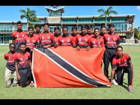 Trinidad and Tobago celebrate their 10th West Indies Rising Stars Under-15 Championship title at the Coolidge Cricket Ground yesterday.