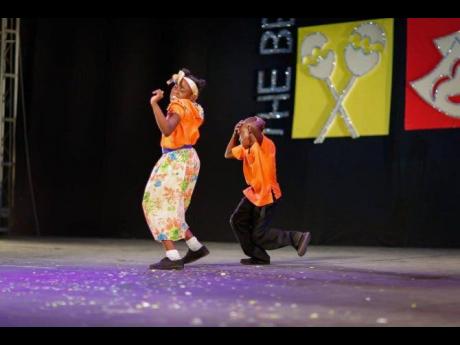 Students of Middle Quarters All-Age School in St Elizabeth perform the Traditional Folk Form, the gerreh, at the National Finals of the Festival of the Performing Arts.