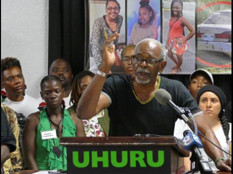 In this file photo, Omali Yeshitela, chairman of the International People’s Democratic Uhuru Movement, St Petersburg, addresses the recent killings of black males, and police on July 8, 2016, in Dallas. Four Americans affiliated with a Black empowerment 