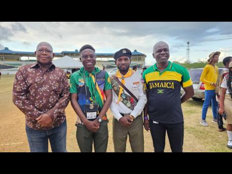Professor Lincoln Edwards (left), president of Northern Caribbean University (NCU), offered scholarships to 100 prospective students at the Fifth Inter-American Division of Seventh-day Adventists’ Pathfinder Camporee. The announcement was made to over 11
