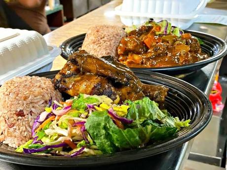 Credit: Contributed Taste of the Caribbean’s highly sought-after Jerked chicken and oxtail meals.