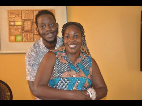 
Debbie Baker and her 21-year-old son Carlton Jenkins in a playful mood.