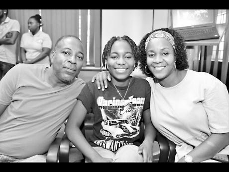
15-year-old Marissa Gordon with parents Maurice and Claudine Gordon. Marrisa is one of the Bustamante Hospital for Children’s 60th Anniversary ambassadors. The family is grateful for the staff saving Marissa’s life four years ago after her appendix ru