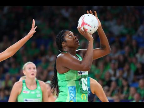 Jhaniele Fowler shooting for the West Coast Fever in the Suncorp Super Netball League.