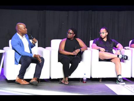 Kevin Clarke (left), digital and social media manager at The Jamaica National Group, captures the attention of Cassandra Campbell, brand marketing strategist, Meta; and Rashaad Lambert, senior executive vice president at For(bes) The Culture, as they discu