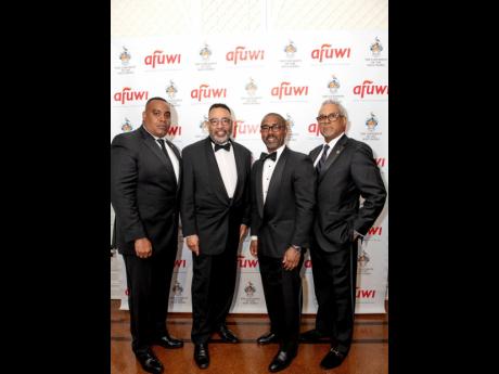 Credit: Margot Jordan Burns Dr Cyrus McCalla (second left), chairman of the American Foundation for The University of the West Indies, with guests (from left) Sheron Cloyd, Mark Price, and Niles Stewart.