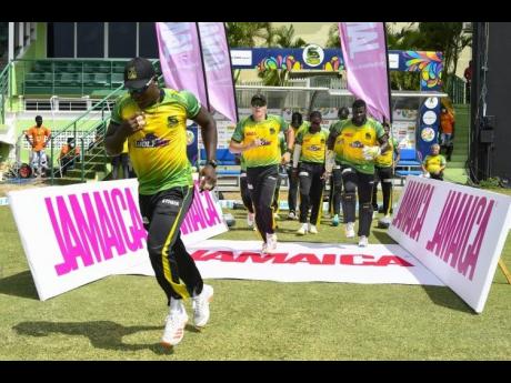 Jamaica Tallawahs’ Rovman Powell leads the team out ahead of a Hero Caribbean Premier League match last year.