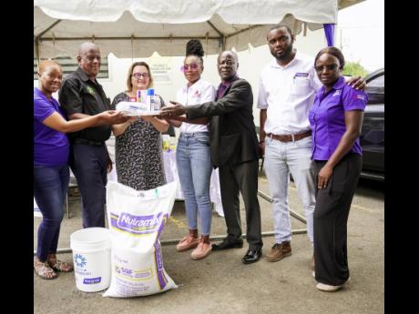 Nelsa English-Johnson (left), country coordinator, World University Service of Canada (WUSC) Caribbean, Franklin Witter (second left), minister of state in the Ministry of Agriculture and Fisheries, Emina Tudakovic (third left), High Commissioner, Canada, 