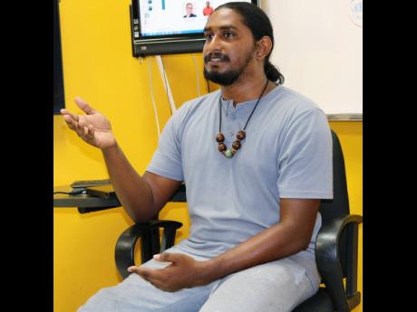 Romario Anderson, research officer at the Mona GeoInformatics Institute at the University of the West Indies, Mona
