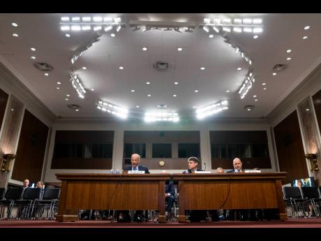 Gregory Becker, former CEO of Silicon Valley Bank, left, Scott Shay, former chairman and co-founder of Signature Bank, and Eric Howell, former president of Signature Bank, testify during a Senate Banking, Housing, and Urban Affairs hearing examining the fa