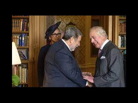 King Charles (right) greeting Prime Minister Dr Ralph Gonsalves.
