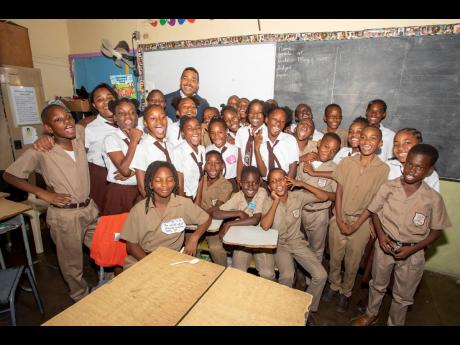 It is difficult to determine who enjoyed Read Across Jamaica Day more on May 9, but the teachers and students of St Francis Primary & Infant School gave an emphatic ‘A’ grade to Nigel Holness, managing director, CIBC FirstCaribbean, for his efforts. He