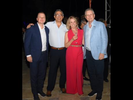 Credit: Ashley Anguin From left: Maxwell Jardim, business development manager, Rainforest Seafoods; Prem Mahtani, owner/director of H.K. Mahtani & Sons Ltd. and Jewels & Time; Shelagh Jardim, director, Rainforest Seafoods; and husband, Brian Jardim, chief executive officer of R
