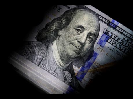 The likeness of Benjamin Franklin is seen on US$100 bills. If the debt crisis now roiling Washington were eventually to send the United States crashing into recession, the repercussions of a first-ever default on the federal debt would reverberate around t