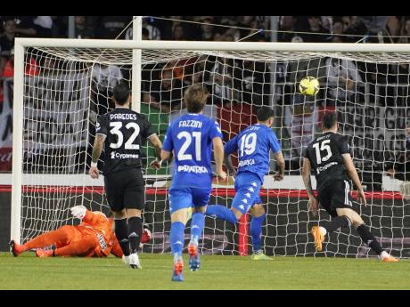 Empoli’s Francesco Caputo (second right)  scores his side’s third goal during the Serie A match between Empoli and Juventus, at the Carlo Castellani stadium in Empoli, Italy yesterday. Empoli won 4-1.