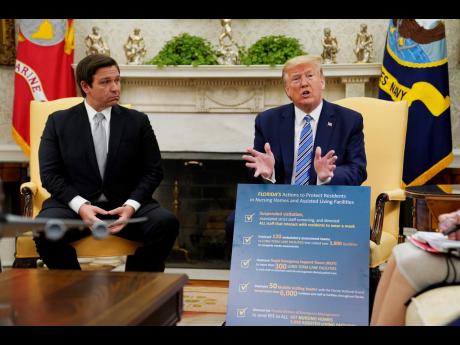 Former US President Donald Trump (right) and Florida Governor Ron DeSantis.