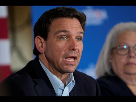 Florida Governor Ron DeSantis speaks at a political roundtable in Bedford, New Hampshire.