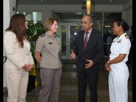 Credit: Ashley Anguin Deputy Prime Minister Dr Horace Chang (second right) in discussion with (from left) Amy Tachco, chargé d’ affaires, US Embassy; General Laura Richardson, commander, US Southern Military Command; and Rear Admiral Antonette Wemyss Gorman, chief of defence