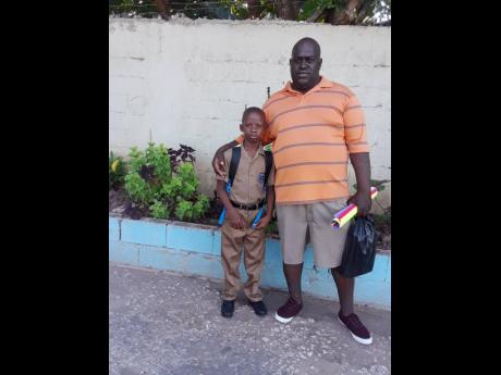 Horace Lindsay and son Usain