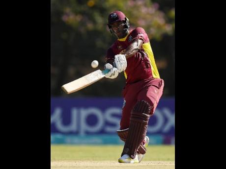 Johnson Charles goes on the attack during his top score of 66 for the West Indies yesterday.